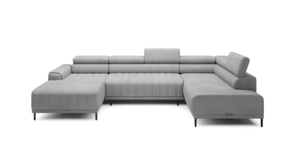 Narożnik rozkładany Caldo XL z regulowanymi zagłówkami i pojemnikiem na pościel w nowoczesnym salonie