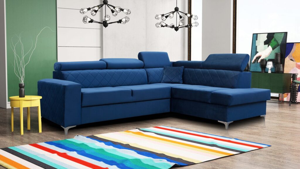 Narożnik rozkładany Gloss z regulowanymi zagłówkami i metalowymi nóżkami w nowoczesnym salonie