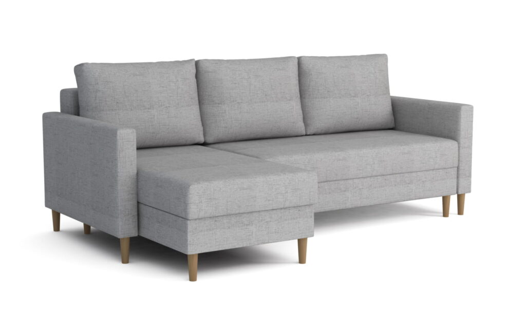 Narożnik rozkładany Gomez Z1 w nowoczesnym salonie z jasnoszarą tapicerką i drewnianymi nogami