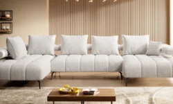 Nowoczesna sofa Magnetic XL w jasnym salonie z dekoracyjnymi poduszkami i drewnianą podłogą