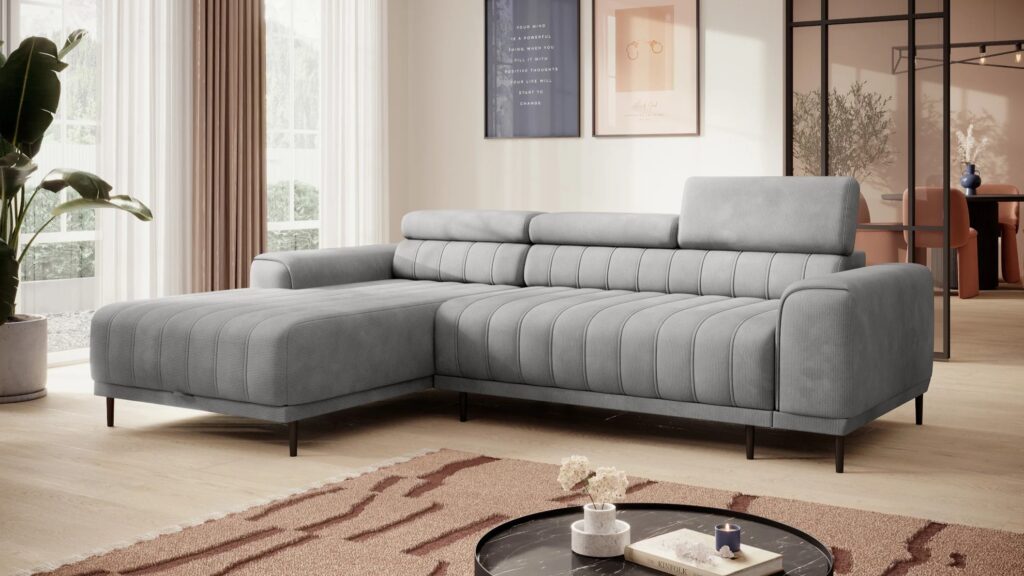 Narożnik rozkładany Caldo S z regulowanymi zagłówkami i pojemnikiem na pościel w nowoczesnym salonie