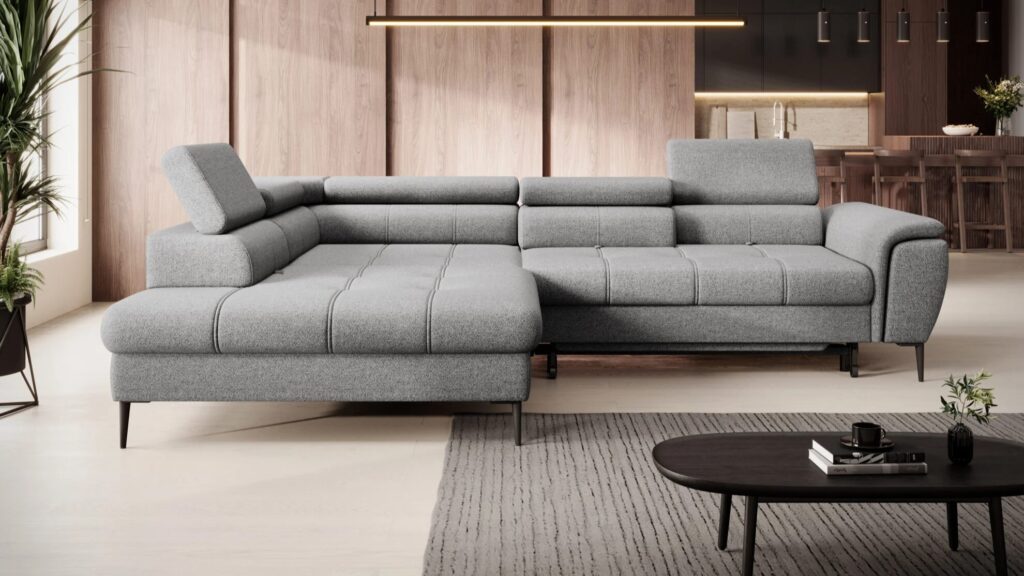 Narożnik rozkładany Denver L w nowoczesnym salonie z funkcją spania i pojemnikiem na pościel