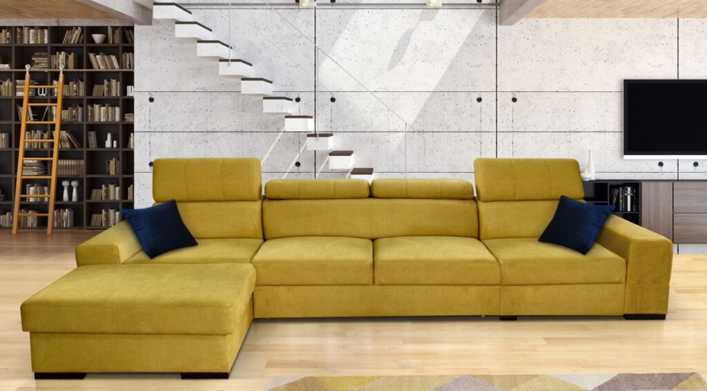 Narożnik rozkładany Apollo Mini Plus w nowoczesnym salonie z regulowanymi zagłówkami i pojemnikiem na pościel