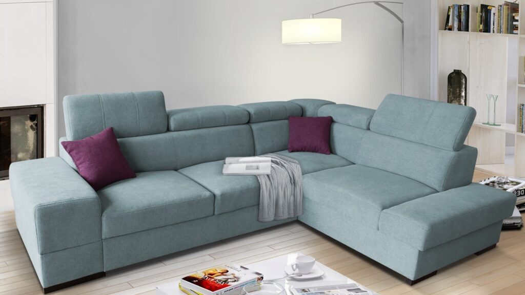 Narożnik rozkładany Apollo Premium w nowoczesnym salonie z regulowanymi zagłówkami i pojemnikiem na pościel