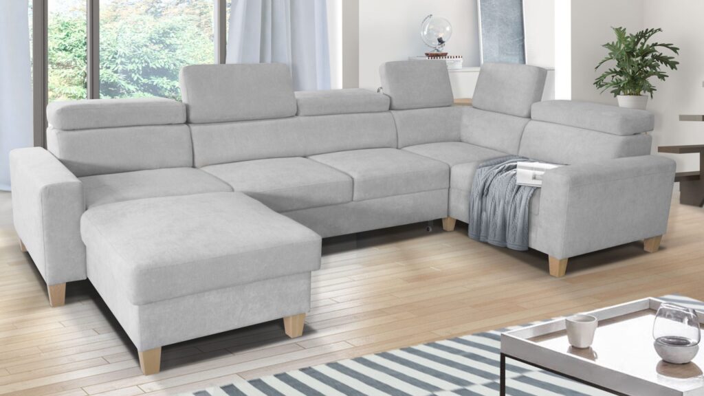 Narożnik rozkładany Leo Maxi w nowoczesnym salonie z regulowanymi zagłówkami i pojemnikiem na pościel