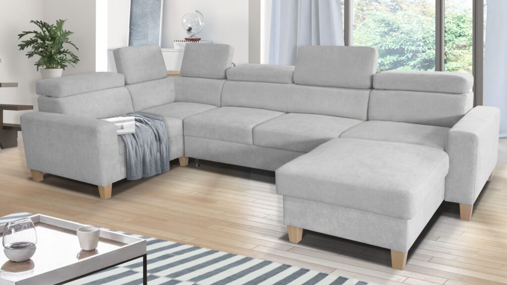 Narożnik rozkładany Leo Maxi w nowoczesnym salonie z regulowanymi zagłówkami i pojemnikiem na pościel
