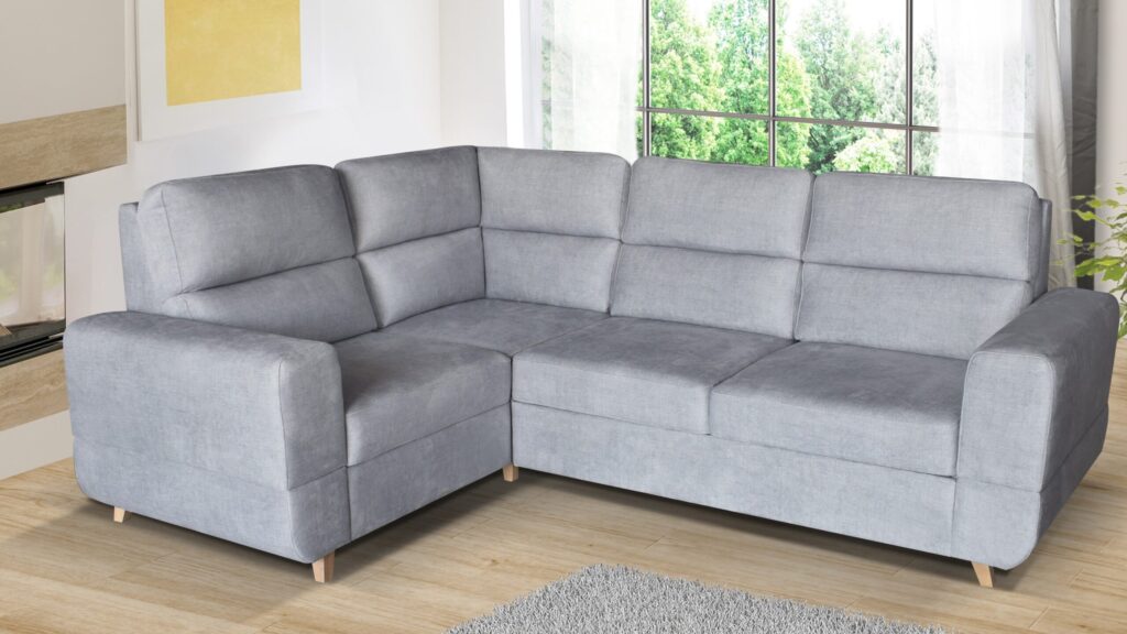 Narożnik rozkładany Maximus w nowoczesnym salonie z funkcją spania i pojemnikiem na pościel