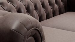 Sofa Chesterfield 2 osobowa tapicerowana naturalną skórą z głębokim pikowaniem w klasycznym stylu angielskim