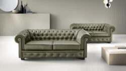 Fotel Chesterfield z naturalnej skóry z głębokim pikowaniem i równą wysokością oparcia i podłokietników