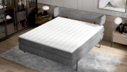 Łóżko tapicerowane Nobile 140x200 z eleganckim zagłówkiem na metalowych wspornikach w nowoczesnym stylu