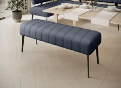Tapicerowany czarny puf Alto z tkaniny Ilias-2 na wysokich nogach, nowoczesny design