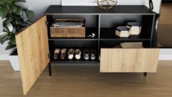 Komoda Lanzzi 120 czarny mat z frontem dąb artisan na metalowych nóżkach w nowoczesnym wnętrzu