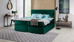 Łóżko kontynentalne Softy 140x200 z tapicerką Monolith-37 i chromowanymi nóżkami na tle jasnego wnętrza