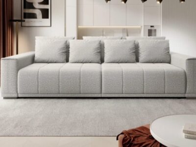 Sofa rozkładana Motta w stylu nowoczesnym z pikowanym siedziskiem i siedmioma poduszkami