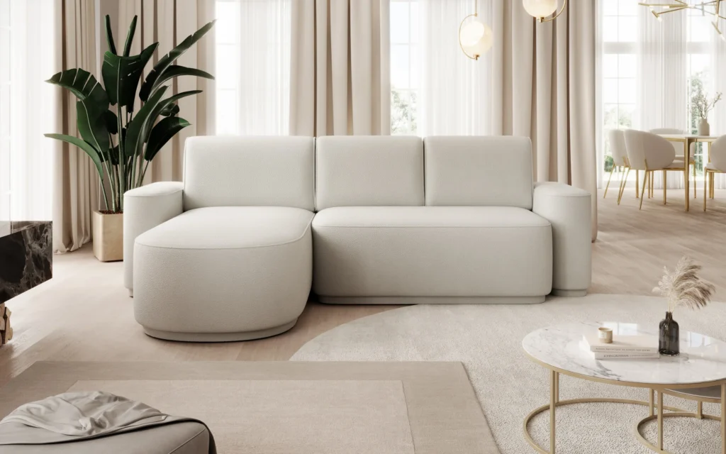 Narożnik rozkładany Aurumm w tkaninie Amore-01 z dużymi poduszkami i zaokrąglonymi podłokietnikami