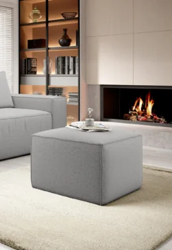 Nowoczesny puf Silla w tkaninie Gojo-04 o neutralnym kolorze, idealny do salonu lub sypialni