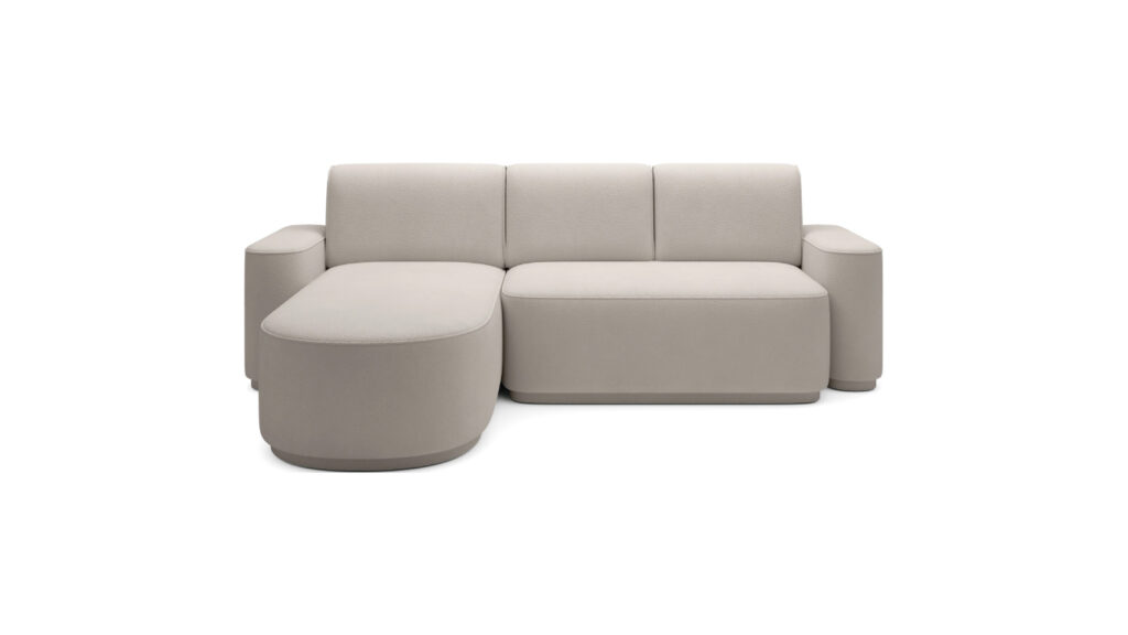 Narożnik rozkładany Aurumm w tkaninie Amore-01 z zaokrąglonymi podłokietnikami i dużymi poduszkami oparciowymi