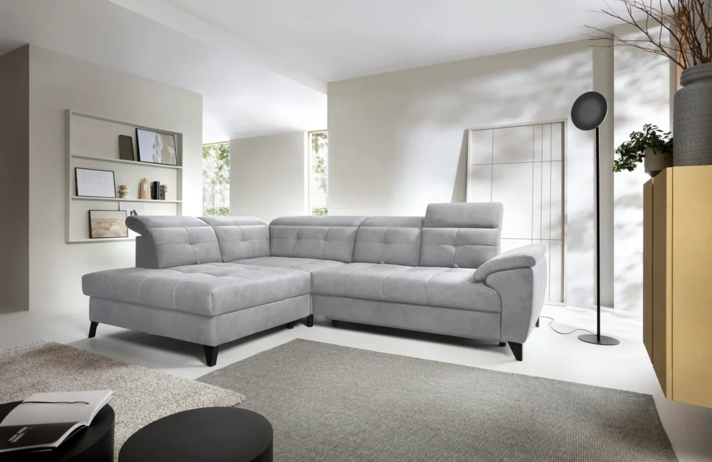 Szary narożnik rozkładany Inferne w tkaninie Aura-04 z regulowanymi zagłówkami i pojemnikiem na pościel