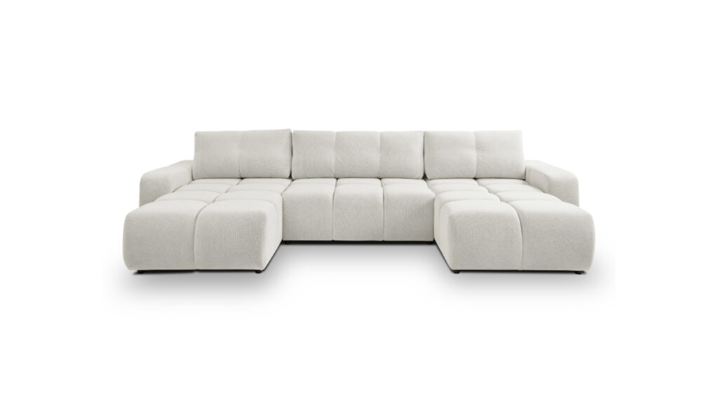 Narożnik U rozkładany Soho w nowoczesnym salonie z miękkimi poduszkami i czarnymi nóżkami